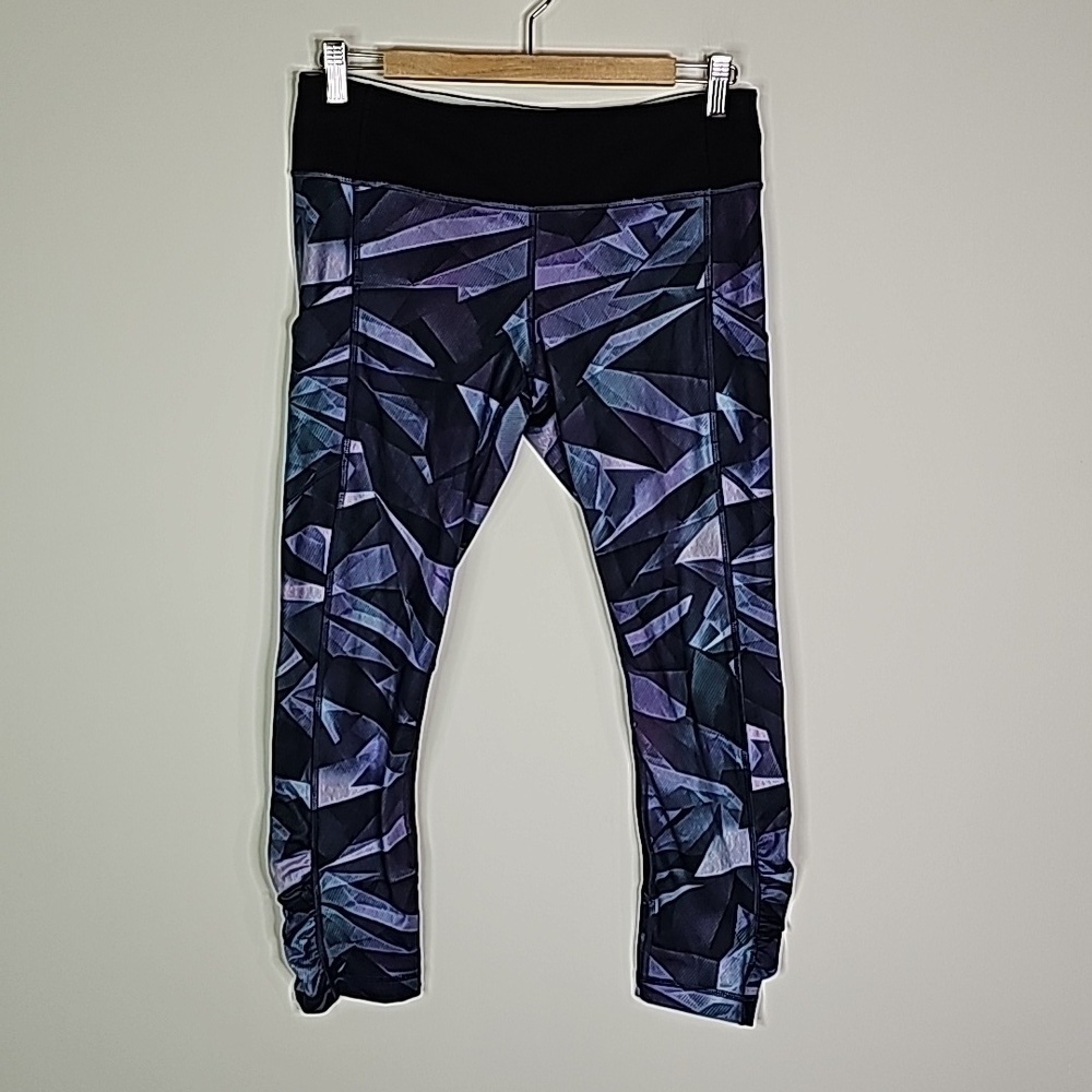 Lululemon purple and black size 8 athletic cropped leggings